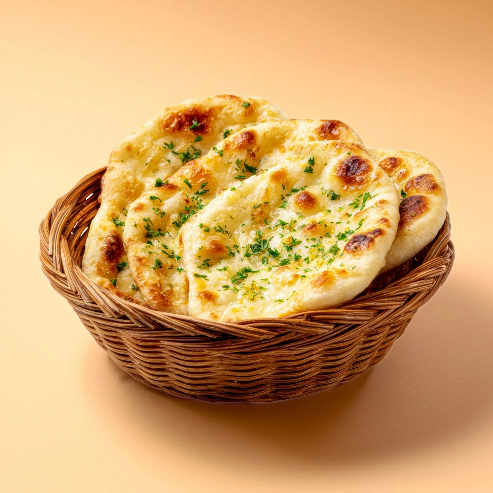 Freshly baked Butter Naan brushed with melted butter