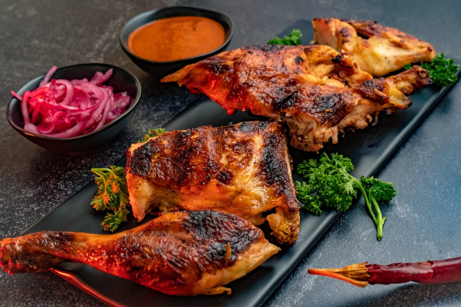 Tandoori Chicken char-roasted to smoky perfection in clay oven